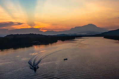 Scenic view of lake during sunset