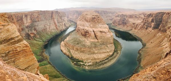 High angle shot of lake along rocky landscape