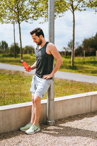 Full length of young man looking at camera