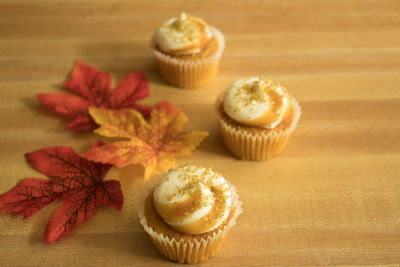 Close-up of cupcakes on table