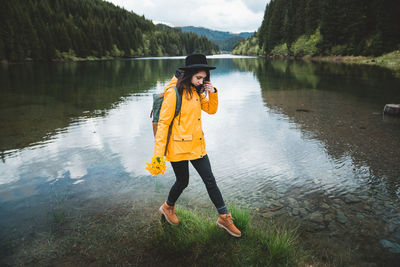 Portrait of woman standing in lake