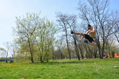 Full length of man jumping in park