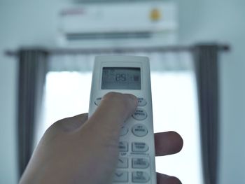 Close-up of air conditioner remote