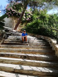 Full length of man walking on stairs