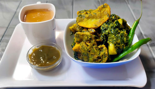 High angle view of breakfast served on table