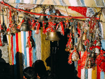 Clothes hanging on wall at market stall