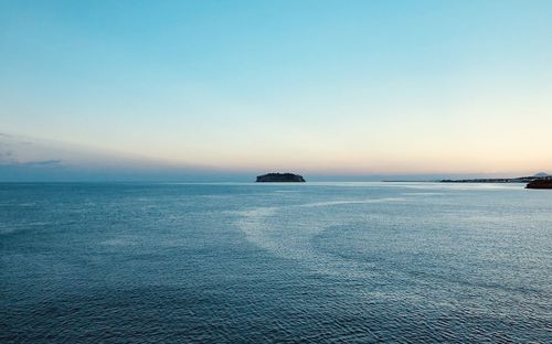 Scenic view of sea against clear sky