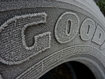 Close-up of text on old stone wall