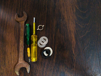 Directly above shot of multi colored bottles on table