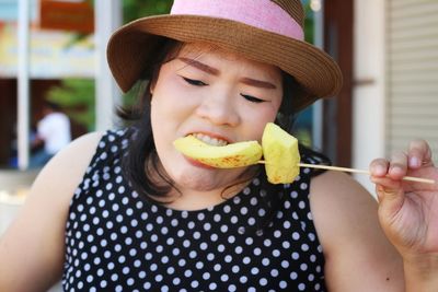 Close-up of woman eating food