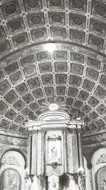 Low angle view of illuminated ceiling