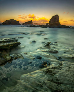 Scenic view of sea against sky during sunset