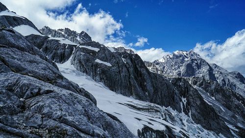 Scenic view of mountains against sky during winter