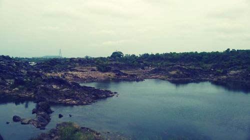 Scenic view of river against sky