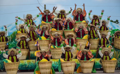 People performing with baskets at manggahan festival