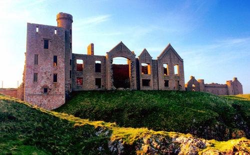 Exterior of castle against blue sky