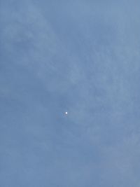 Low angle view of moon in sky