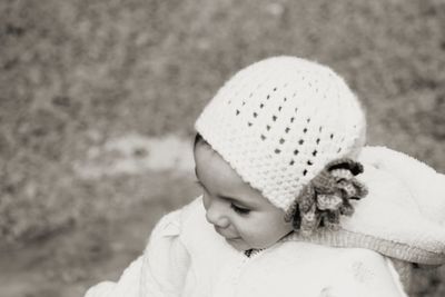 Close-up of cute girl wearing knit hat