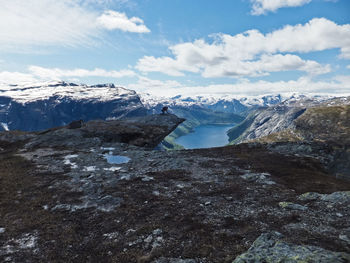 Scenic view of snow covered mountains against sky