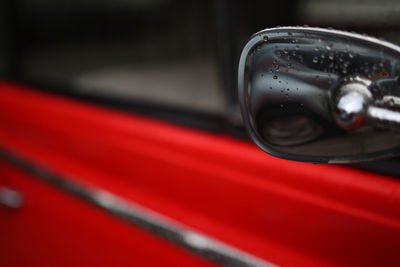 Close-up of car on side-view mirror