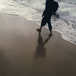 Low section of man on beach