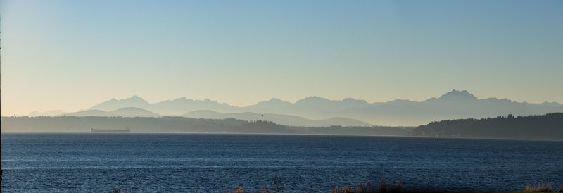 Scenic view of sea against clear sky during sunset