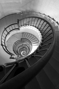 Directly below shot of spiral staircase of building