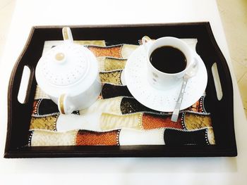 Close-up of coffee cup on table