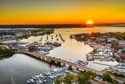High angle view of harbor at sunset