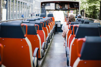 Rear view of people on bus