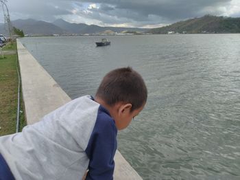 Boy looking at sea