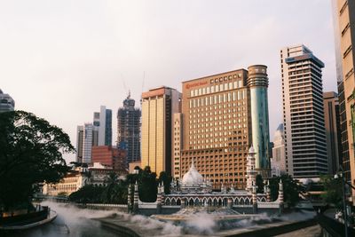 Buildings against sky in city