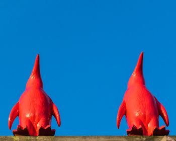 View of fish against blue sky