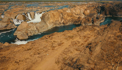 High angle view of rock formation in water