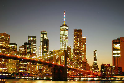 Illuminated buildings in city at night