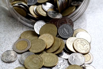 Close-up of coins on table