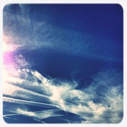 Scenic view of landscape against cloudy sky