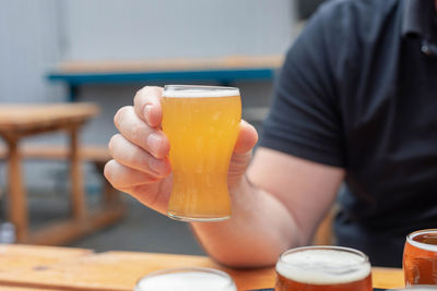 Midsection of person holding ice cream