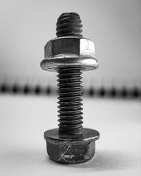 Close-up of metallic stack on table