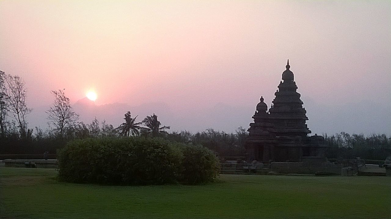 SILHOUETTE OF TEMPLE AT SUNSET