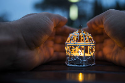 Close-up of human hand holding glass