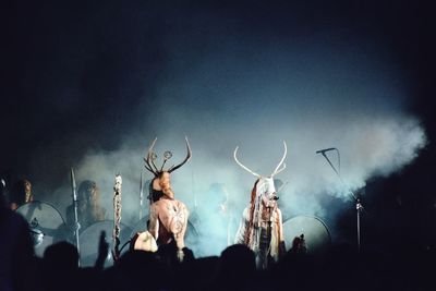 Low angle view of crowd playing at music concert