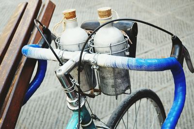 High angle view of bicycle with water bottles
