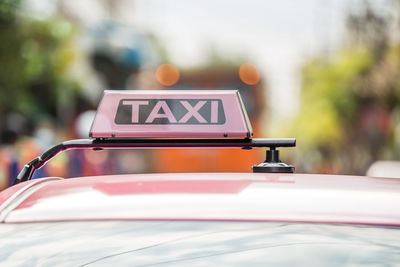 Close-up of sign on car