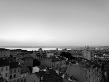 High angle shot of townscape against clear sky