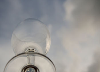 Low angle view of glass against sky