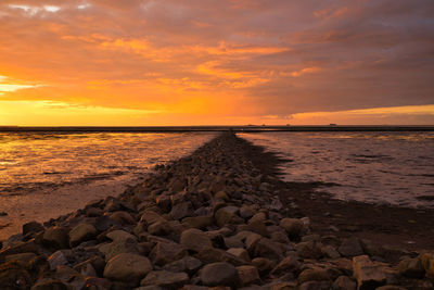 Scenic view of sea against sky during sunset