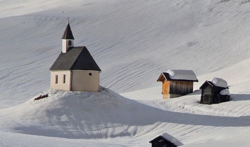 High angle view of building on snowcapped mountain