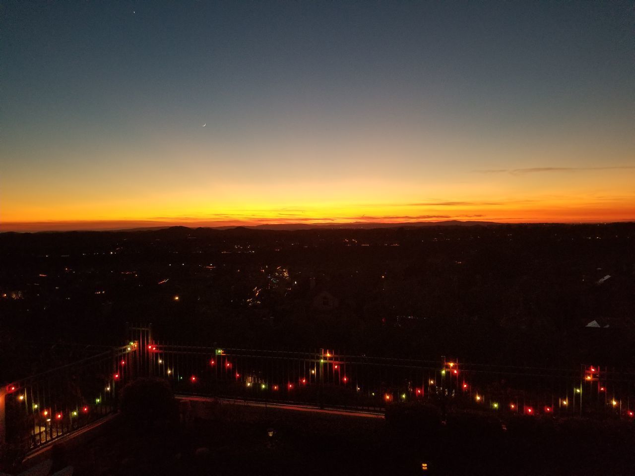 ILLUMINATED CITY AT NIGHT