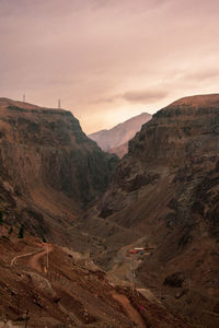 Scenic view of mountains against sky during sunset